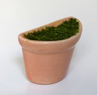 petit vase "demi-rond", orange, avec mousse et herbe
